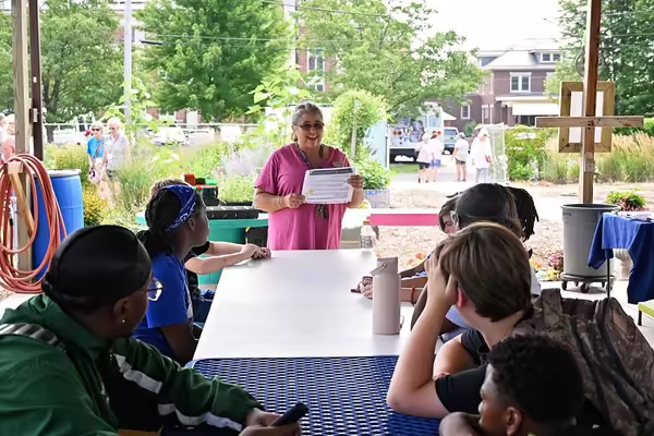 Julie teaching a group of youth