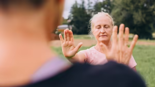 Older woman doing tai chi