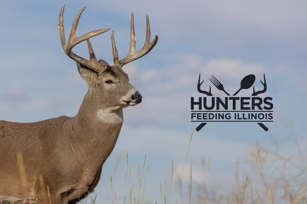 Close-up of a deer with the Hunters Feeding Illinois logo