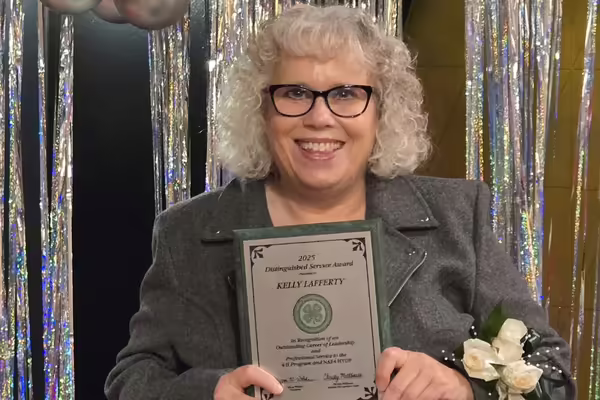 Kelly Lafferty with award