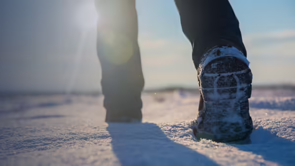 person walking in snow