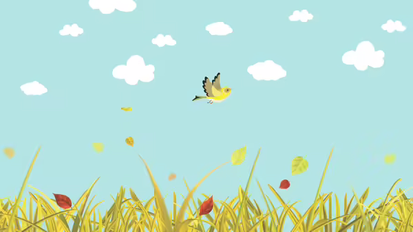 A yellow bird flying over a bare field. 