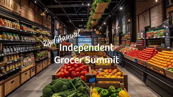 produce aisles of grocery store with the words 2nd annual Independent Grocer Summit.