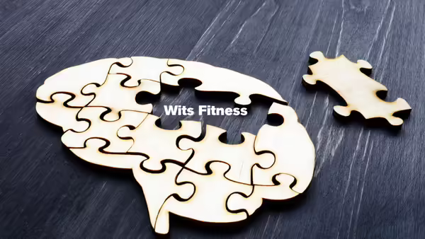 A puzzle shaped like a brain with two pieces missing.