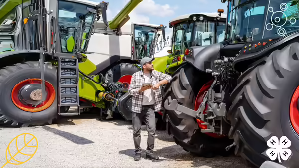 A man in a plaid shirt and cap uses a tablet while standing between large tractors. The image features a yellow leaf icon and white 4-H logo in the corners.