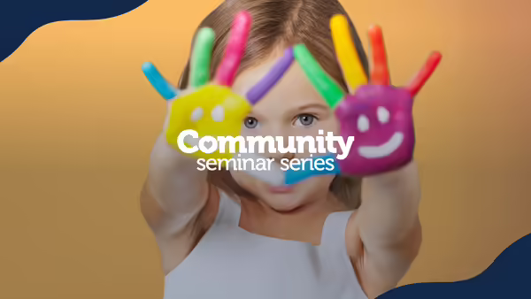 A child with colorful hands
