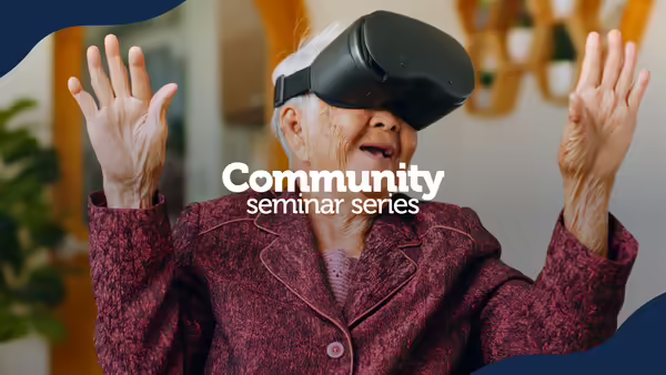 An older woman with virtual reality device.