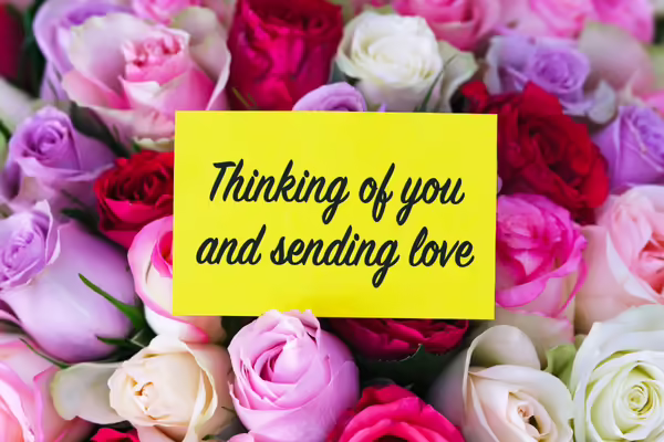 roses with a note Thinking of you and sending love.