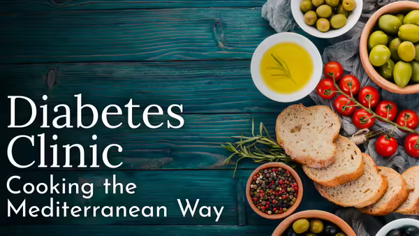 A blue wood table with Mediterranean food on it and the text, "Diabetes Clinic Cooking the Mediterranean Way"