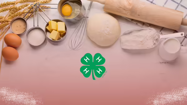 Baking materials including eggs, butter, dough, flour, and a rolling pin.