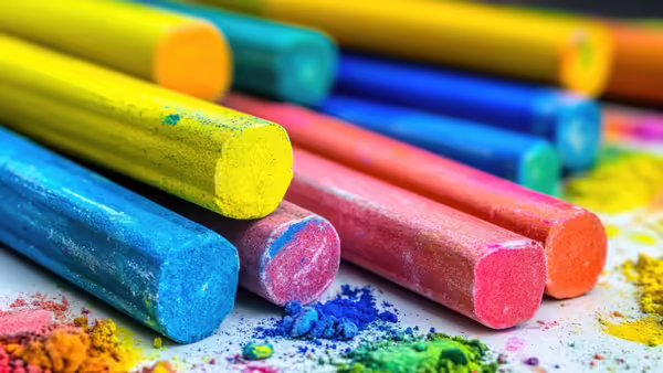 A stack of colorful pigments sticks.