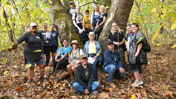a group photo in the woods