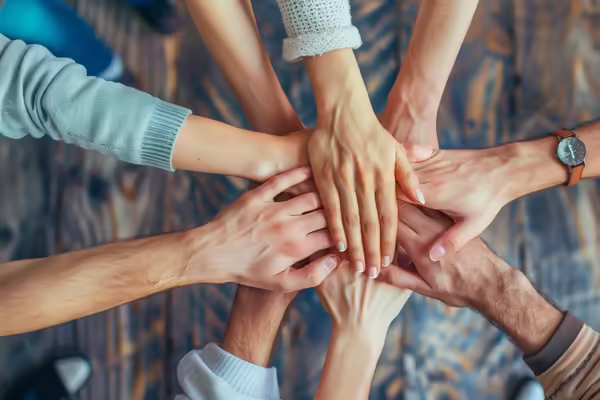 Hands coming together 