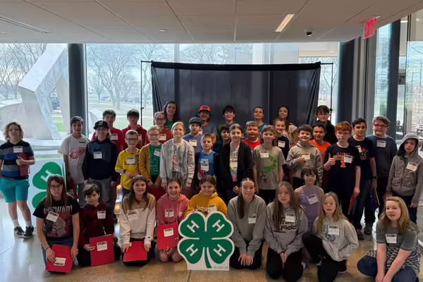 4-H participants pose together for a group photo at IVCC 