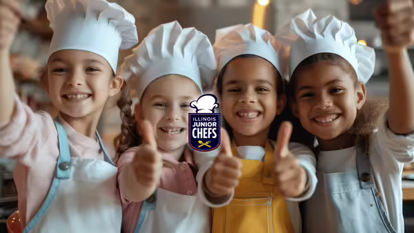 kids in chef hats with thumbs up
