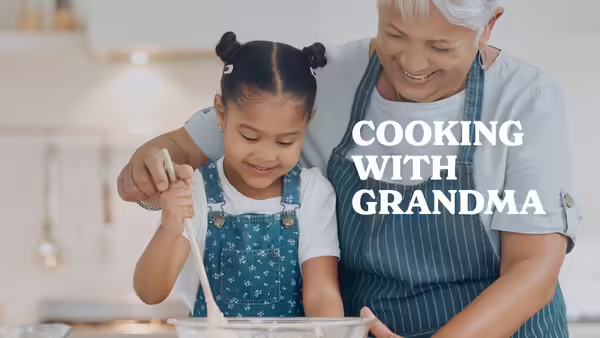 Little girl and grandma mixing up some ingredients