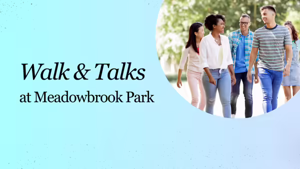 Walks & Talks at Meadowbrook Park with group of adults walking outside