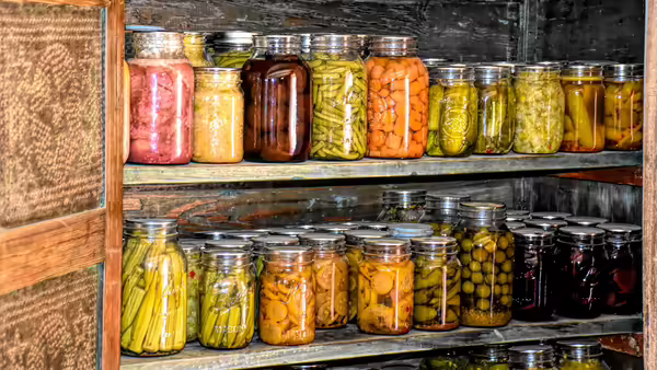 clear jars filled with produce