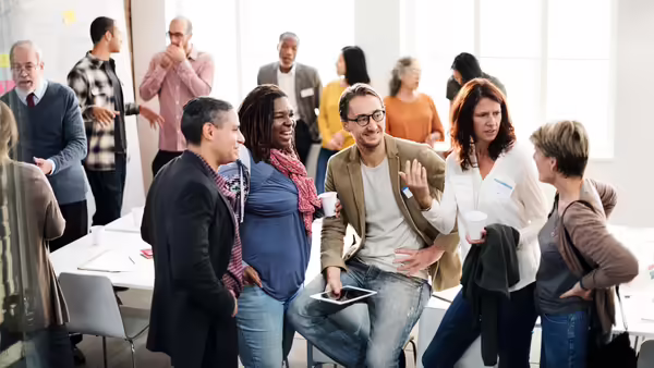 a group of diverse people in a meeting 