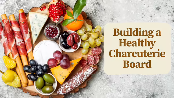 Building a Healthy Charcuterie Board. Background is charcuterie board with different healthy foods.