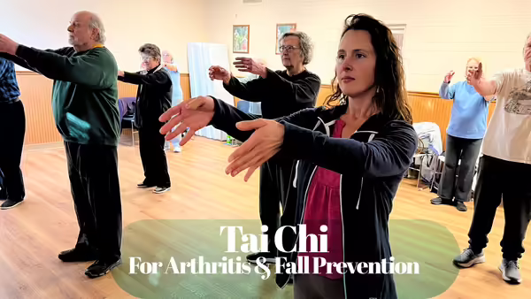 Kristin leadng a tai chi class through moves