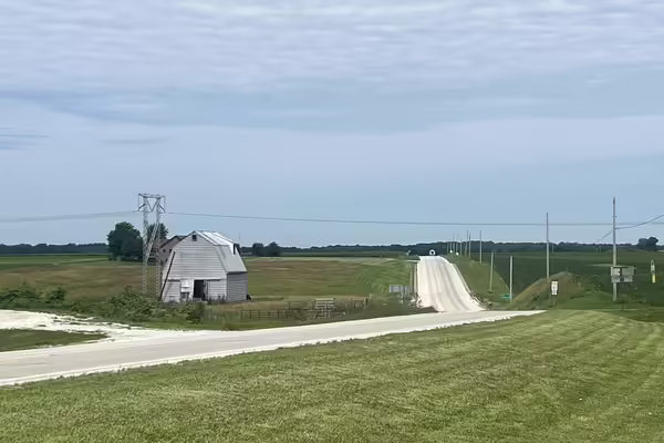 a barn and rural road