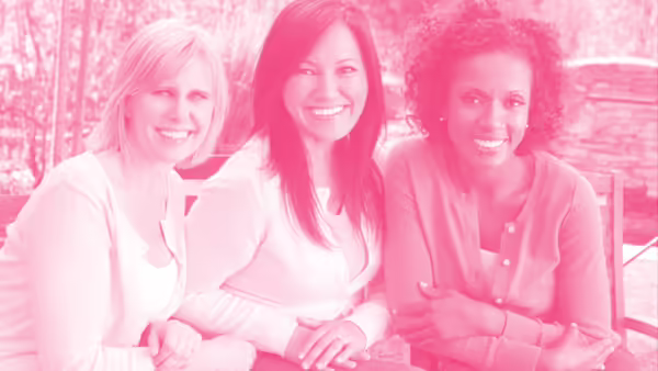 three women sitting together