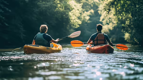two people in kayaks