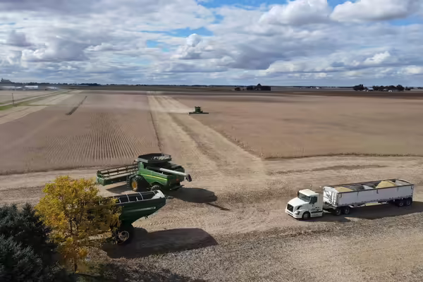 combine and semi during harvest