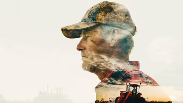 A collage of images in the shape of a man's profile, farm fields, tractors and a farmer in a plaid shirt and baseball cap.