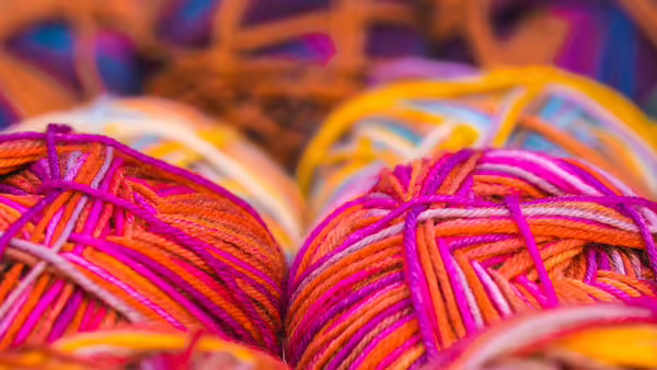 A close-up of bright-colored yarn