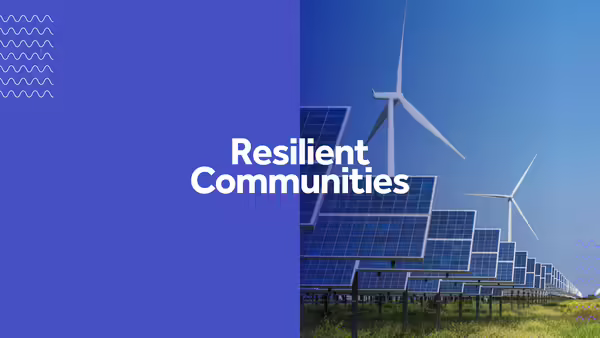Resilient Communities and field with wind turbine and solar panels
