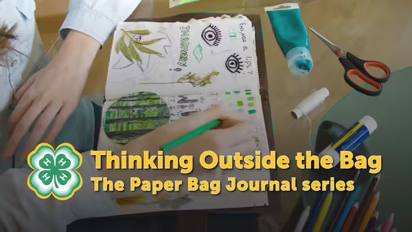Thinking Outside the Bag The Paper Bag Journal Series yellow font overlaying a picture of youth drawing inside a handmade journal