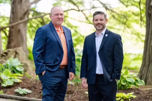 Rodney Johnson (ACES associate dean for research) and Matthew Vann (associate dean and Extension director) standing, left to right