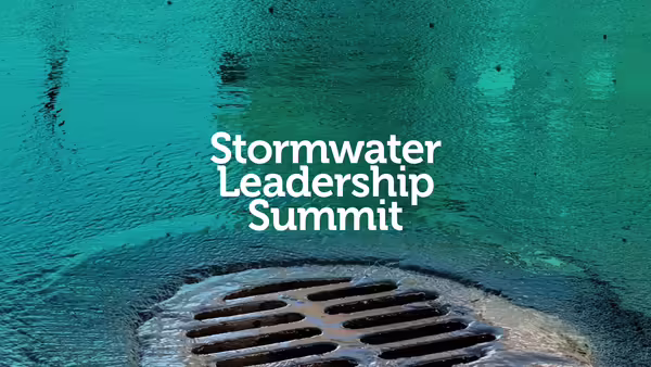 Water flowing into a metal storm drain, overlaid with the headline ‘Stormwater Leadership Summit'