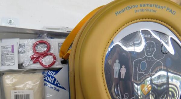 Picture of a defibrillator and first aid kit