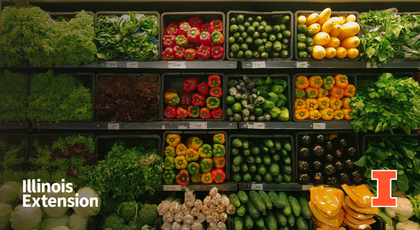 Produce wall at a grocery store containing sections of lettuce, bell peppers, cucumbers, and cauliflower. Contains orange I block logo and Illinois Extension wordmark.