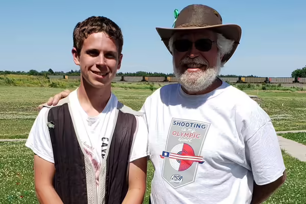 Dakota Larimore-Lamb with 4-H mentor Tom Bates