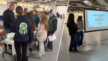 A group of 4-H members stand at a table with a presenter, while a group of people present from a screen that reads: how to select your 4-H project