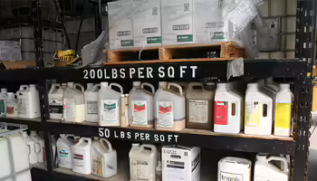 pesticide containers on a shelf
