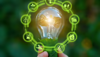 A lightbulb surrounded by energy icons