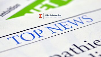 closeup of newspaper page with words "top news" as headline