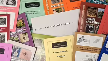 A pile of Pesticide and Farm reference books 
