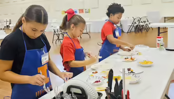 3 children preparing food