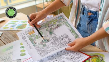 person viewing map of garden plan