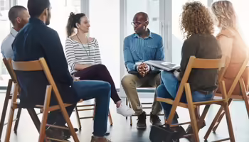 A group of diverse people talking 