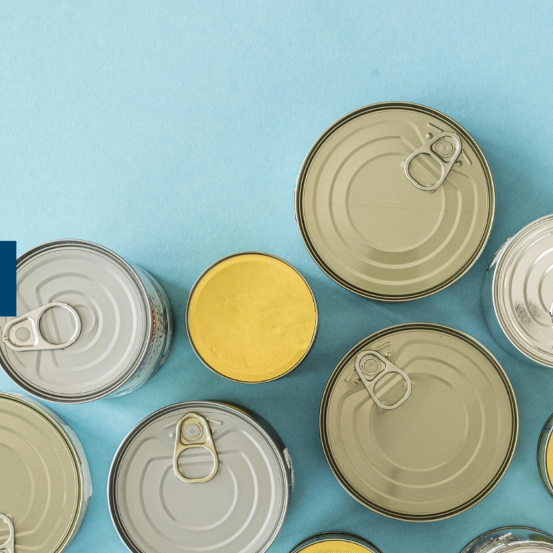 cans gathered on a blue background
