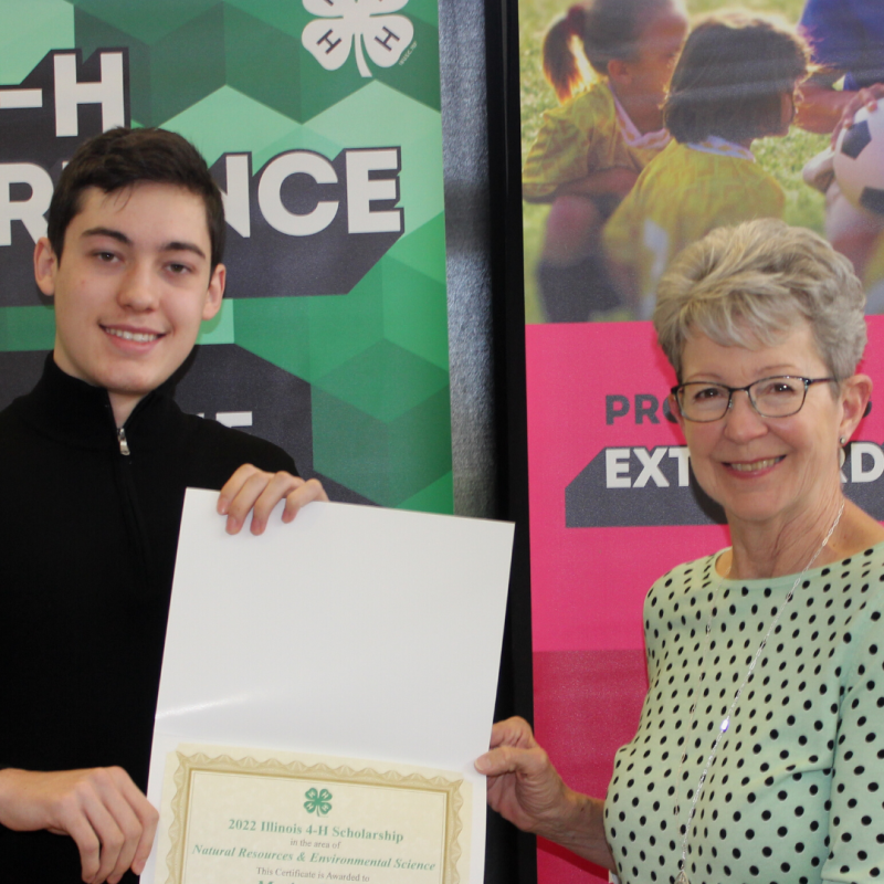 4-H Teen Science Ambassador receiving an award