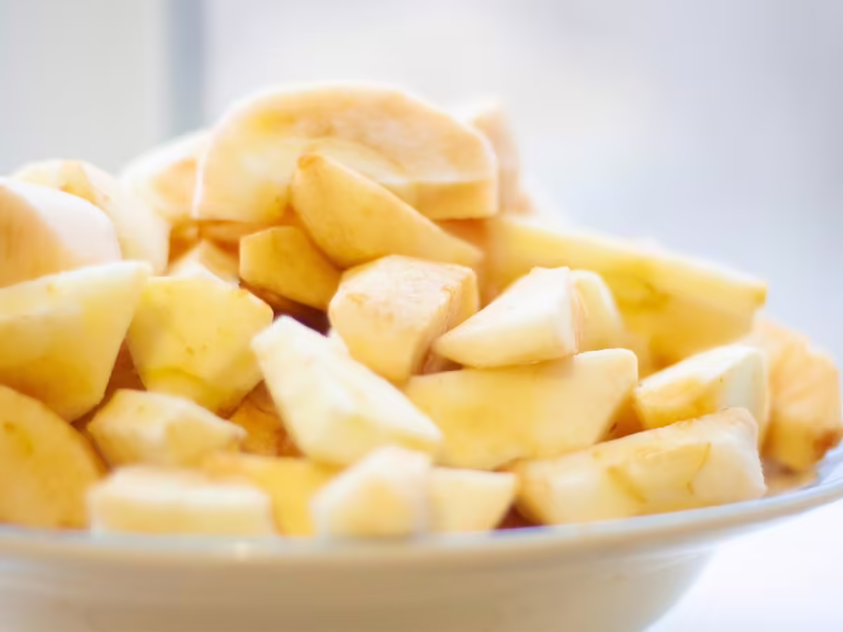 bowl of peeled apple slices starting to brown from exposure to air