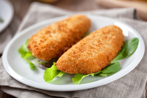 Breaded cod fish filets on a plate